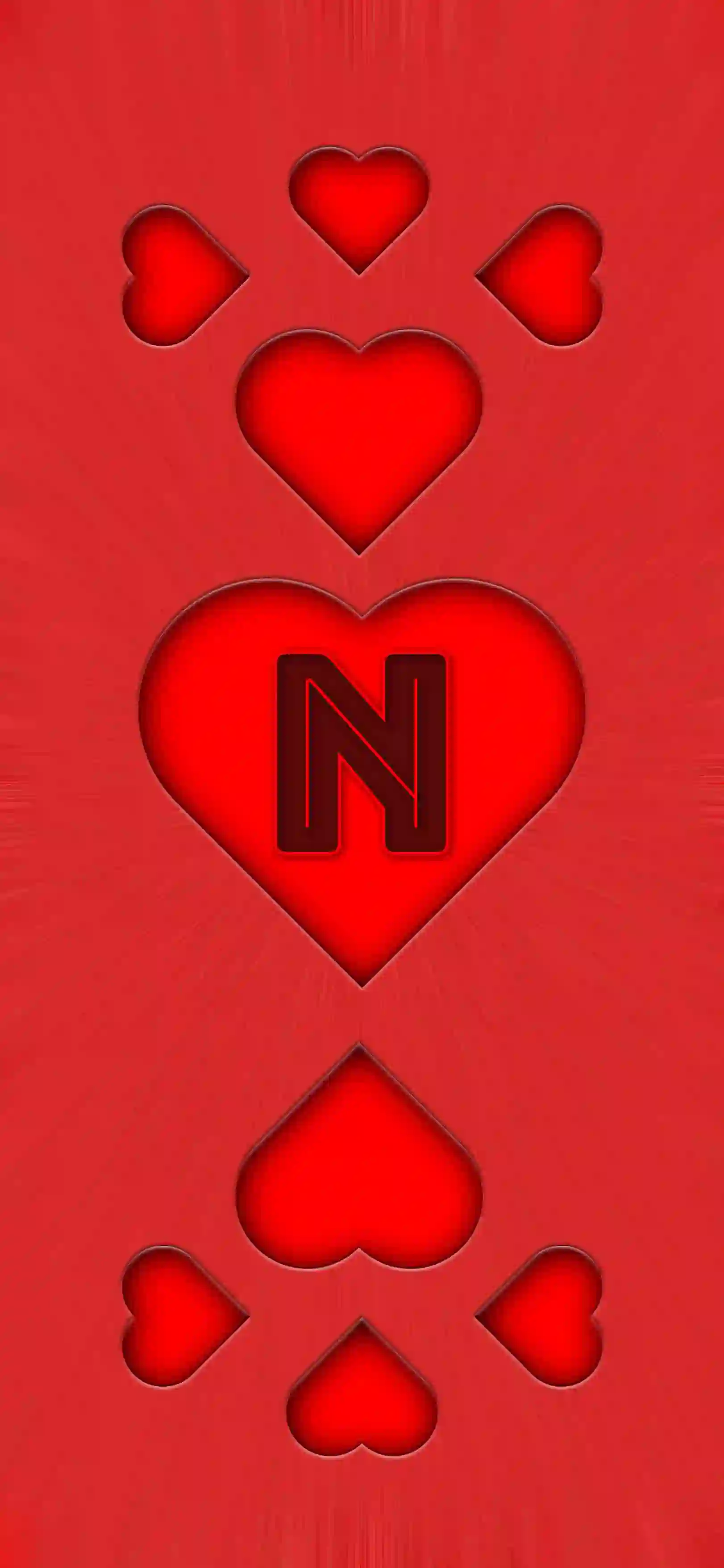 Red heart pattern letter N 4K wallpaper bold letter center heart 3D embossed hearts vivid red background